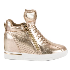 Gyldne sneakers gylden