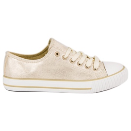 Gyldne sneakers gylden