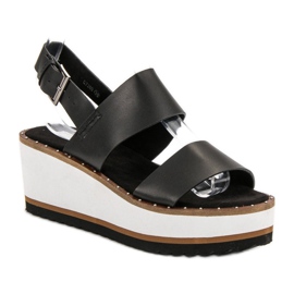 Corina Sorte sandaler på platformen