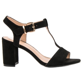 Anesia Paris Sorte sandaler på en bar