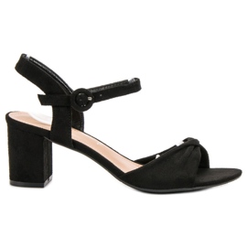 Elegante sorte sandaler