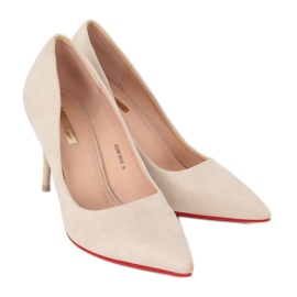 Pumper på en beige E22369 Beige pin