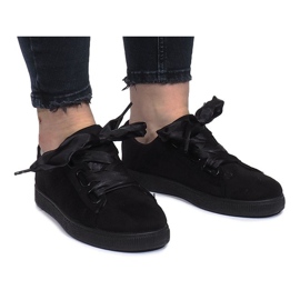 Sorte sneakers med Salomé buer