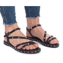 Sorte flade sandaler med Abloom -nitter