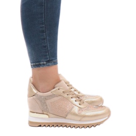 Gyldne sneakers på kilen G-125 gylden