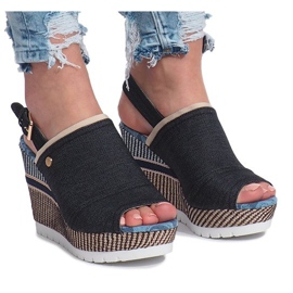 Sorte mulanka jeans med sandaler med kilehæl