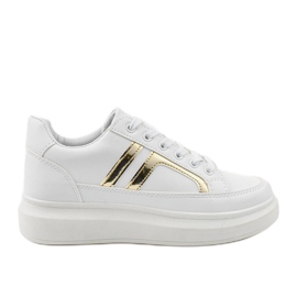 Første hvide sneakers gylden