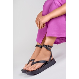 Dameflip-flops fastgjort ved anklen sort 1