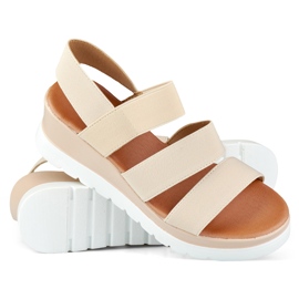 Beige elastiske sandaler med lav platform 1