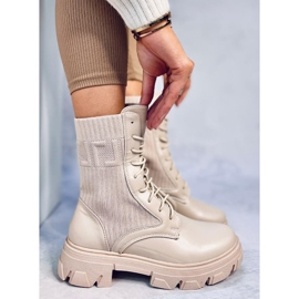 Arbejdere med en fleksibel Calling Beige-overdel 2