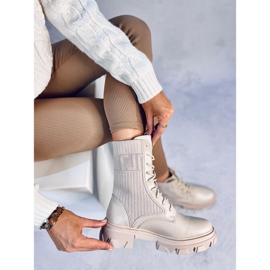Arbejdere med en fleksibel Calling Beige-overdel 1