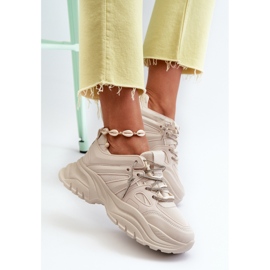 Damesneakers på en massiv sål med dekorativ snøring Beige Relissa 1