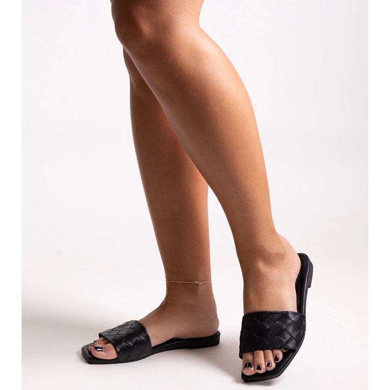 Sorte flip-flops med quiltet Hakimi indersål 1