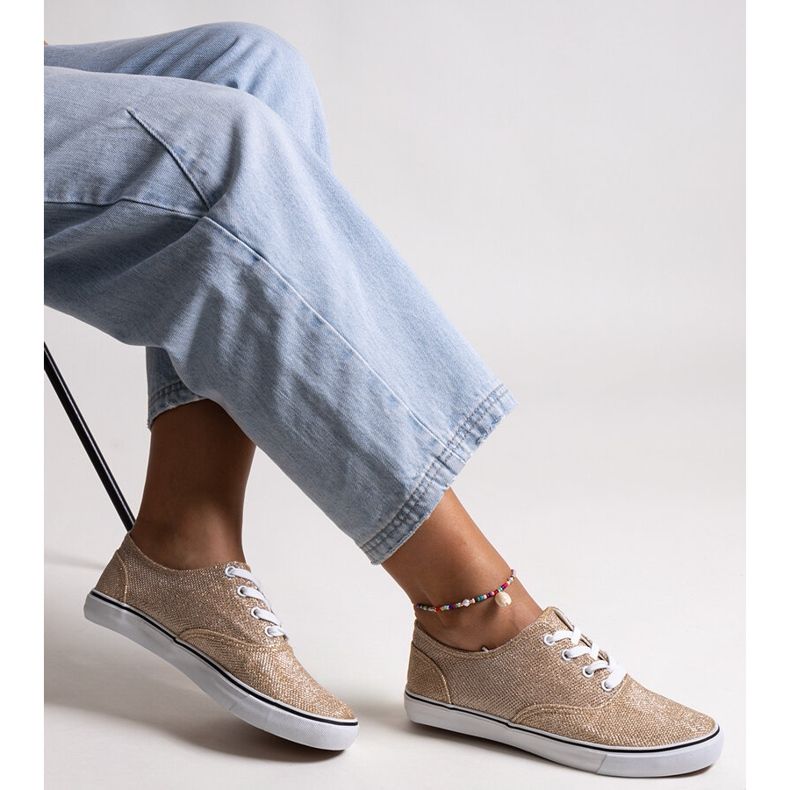 Guld skinnende Carroline sneakers gylden 1