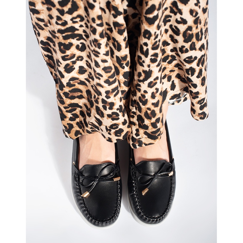Sorte loafers på platformen 1