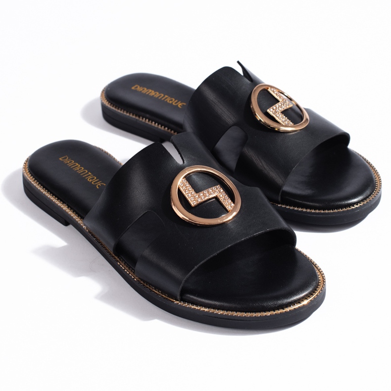 Sorte flade flip-flops med gulddekoration 1