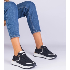 Sorte kvinders sneakers med en gylden indsættelse 1