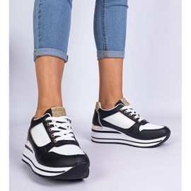 Sorte sneakers dekoreret med glitter og et metalindsats 1