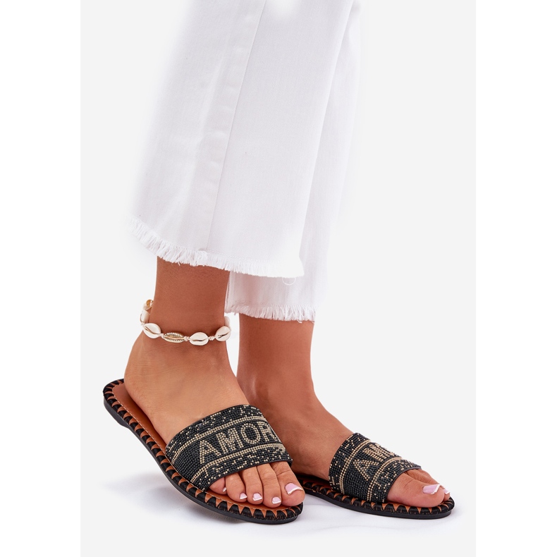 Flat -Hælet kvinder flip flops med sort dekoration 1