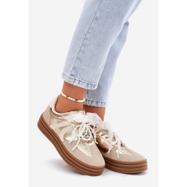 Kvinders sneakers på platformen med beige-guld dekorationer 1