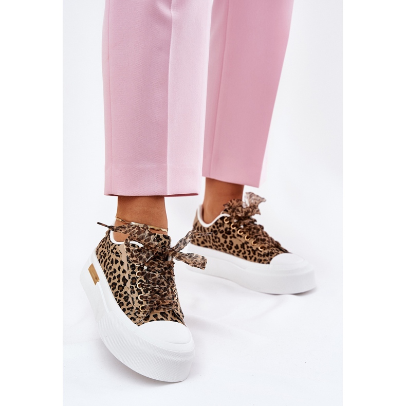 Kvinders sneakers på en massiv platform med dekorativ snøringsbrun leopard 1