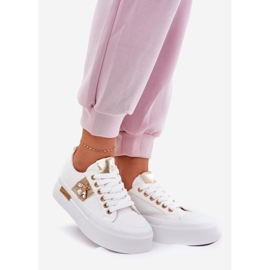 Kvinders sneakers på platformen med en dekorativ detalje hvid 1