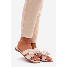 Flad kvinder flip flops med en bue beige 1