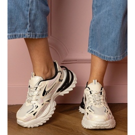 Beige sports -sneakers på en stilfuld sål 1