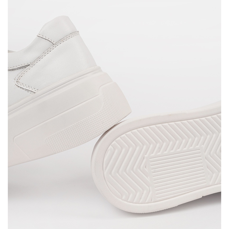 Hvide sneakers på Sergio Leone -læderplatformen 1