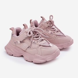Børns sneakers på den lyserøde platform 1