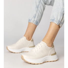 Beige sports sneakers med en gylden indsættelse 1