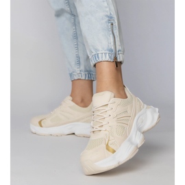 Beige sport sneakers på en massiv sål 1