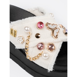 Seastar Hvide flip flops på en sort platform med stifter 1