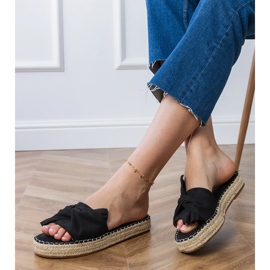 Sorte espadrilles med en bue 2
