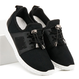 Sorte sneakers med en welt 1