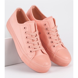 Lyserøde sneakers på bindingen 1