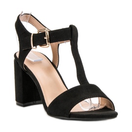 Anesia Paris Sorte sandaler på en bar 1