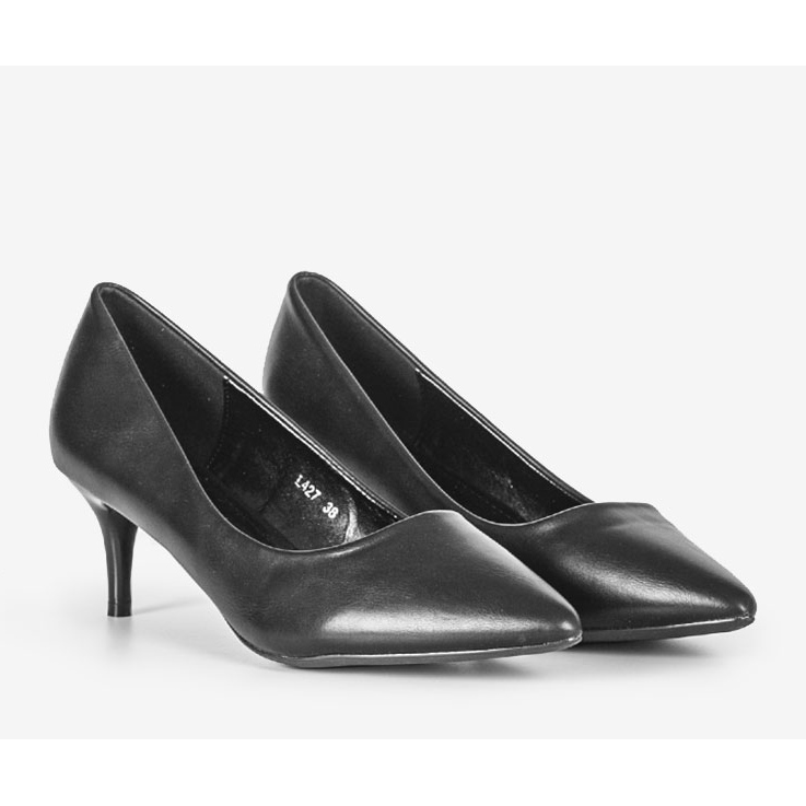 Sorte pumps på en lav Feeling hæl 1