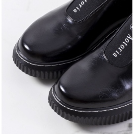 Sorte brogues på Siddons platform 1