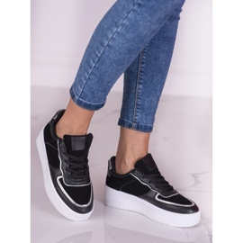 Sorte sneakers med snøre på en høj Shelovet platform 1