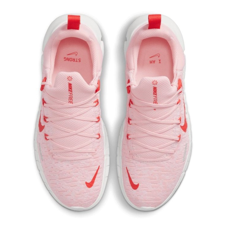 Nike free lyserod hotsell