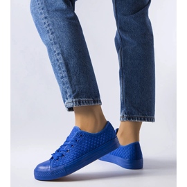 Blå sneakers i vævet stof fra Thibodeau 1